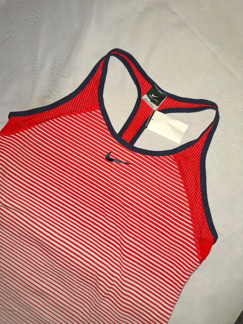 Nike tank top (Category: Activewear) located in Butuan. Submitted by ziggyzizzla (Listing ID 1466693016, Image 2). Description: NIKE tank top Size L EXCELLENT CONDITION.