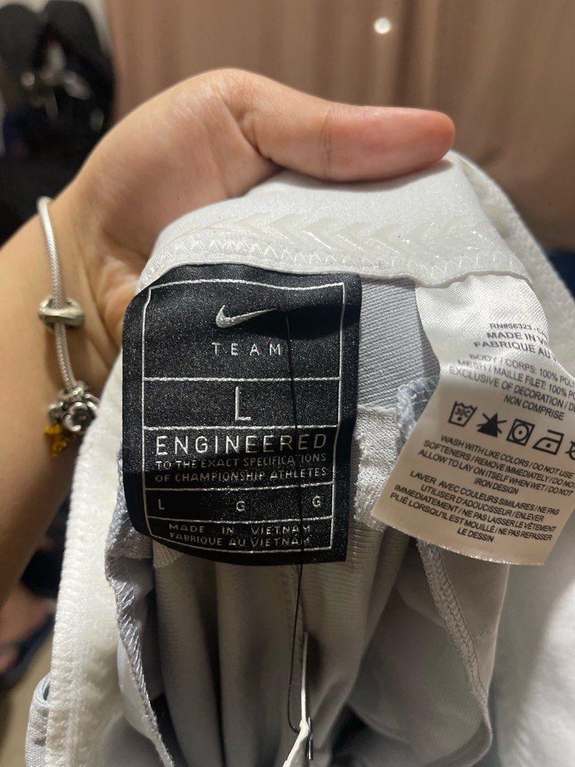 Nike Team Engineered Grey Baseball Pants Size L (Category: Joggers) located in Baguio. Submitted by find_found001 (Listing ID 1466711012, Image 2). Description: - Brand: Nike (Team Engineered) - Color: Grey - Size: Large (tag attached) - Material: 100% polyester, made in Vietnam - Features: Embroidered swoosh logo near pocket, button closure, zipped fly - Fit: Standard athletic fit - Condition: Brand new with tags, ideal for games or practice.