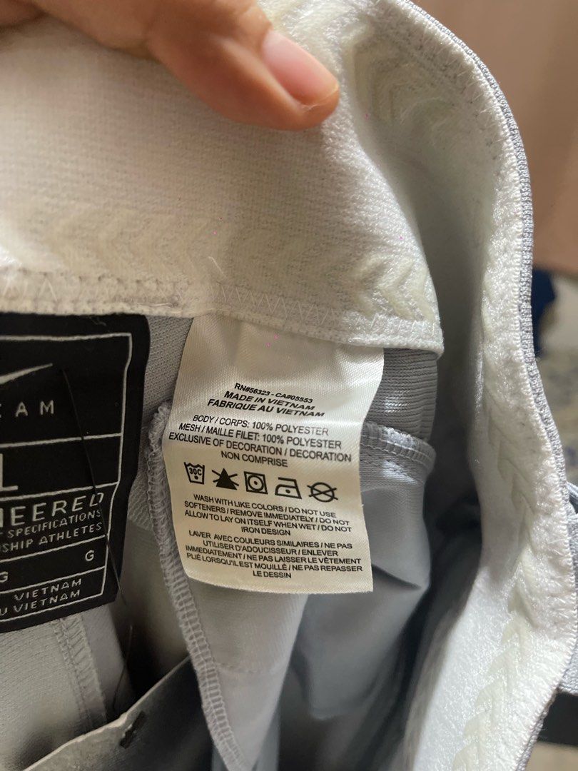 Nike Team Engineered Grey Baseball Pants Size L (Category: Joggers) located in Baguio. Submitted by find_found001 (Listing ID 1466711012, Image 3). Description: - Brand: Nike (Team Engineered) - Color: Grey - Size: Large (tag attached) - Material: 100% polyester, made in Vietnam - Features: Embroidered swoosh logo near pocket, button closure, zipped fly - Fit: Standard athletic fit - Condition: Brand new with tags, ideal for games or practice.