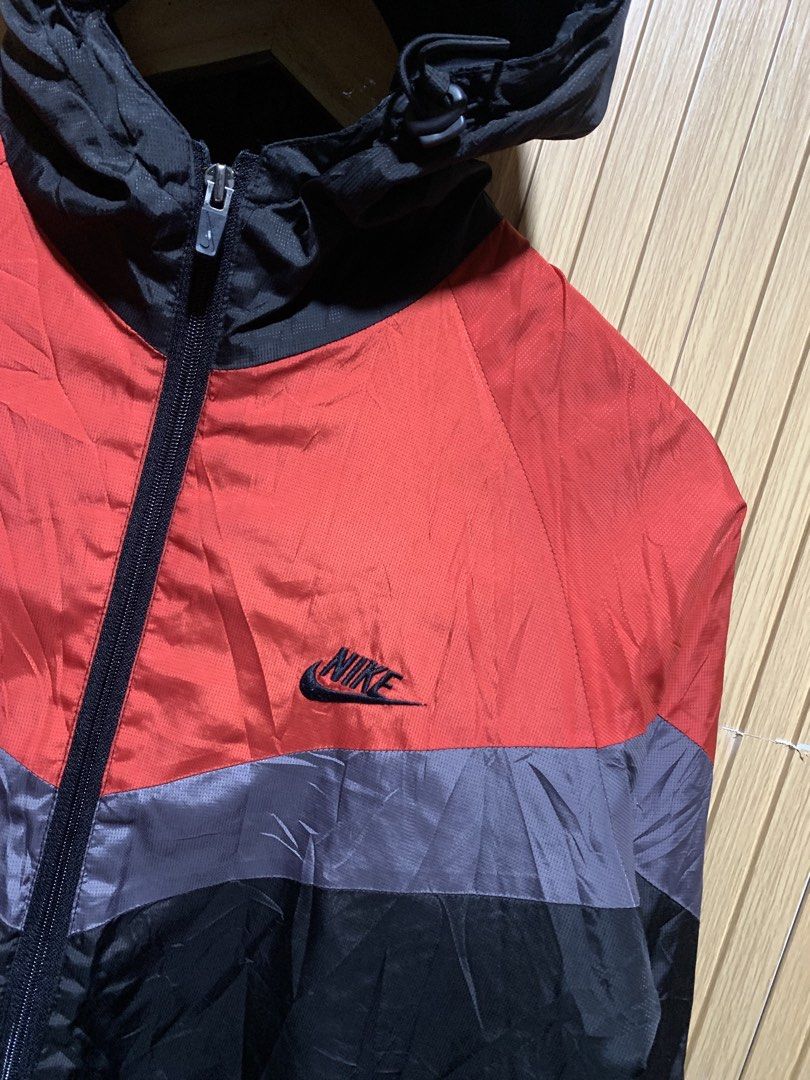 Nike Team Windrunner Jacket Red Black Grey (Category: Coats, Jackets and Outerwear) located in Kidapawan. Submitted by nicnic1_gem (Listing ID 1466714137, Image 2). Description: - Brand: Nike Team - Style: Vintage colorblock windbreaker jacket (Red/Grey/Black) - Features: Full zip closure, hood, embroidered chest logo, warm quilted lining - Origin: Made in Thailand - Size: Medium (M) - Condition: Great vintage piece, perfect for layering in coole