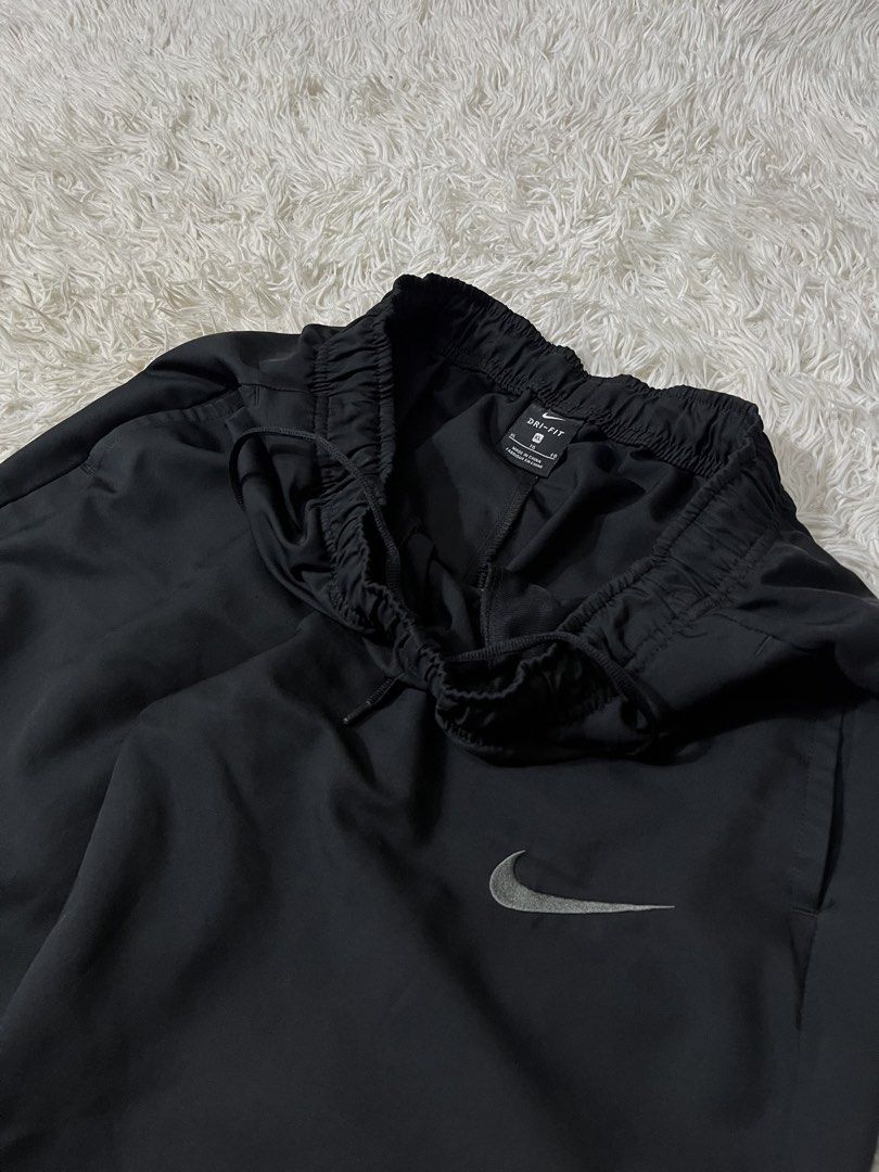 Nike Track Pants Black Side Swoosh - (Category: Joggers) located in Malolos. Submitted by paulogalan77273 (Listing ID 1466769471, Image 3). Description: Nike Track Pants Black Side Swoosh - Condition: Excellent Color rate: 10/10 Size: Large Waist: 30-36 Length: 40 Leg Opening: 8 - Location: Malolos Bulacan Courier: J&T / LALAMOVE / LBC.