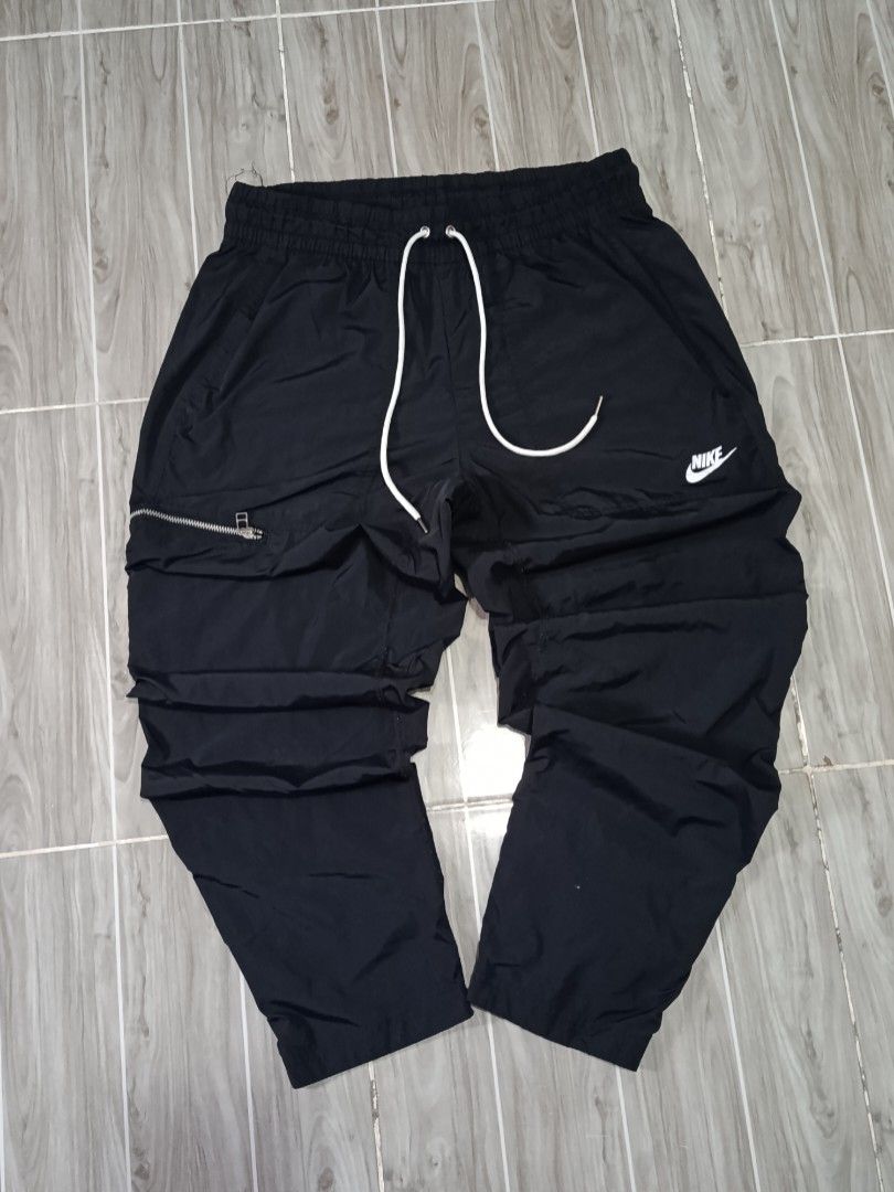 NIKE WOVEN LEISURE PANTS (freeshipping) (Category: Activewear) located in Quezon City. Submitted by gyl-stop (Listing ID 1466718314, Image 1). Description: free shipping 32-38 x 39 very good cond cr: 9.5/10 issue: hairline sa logo.