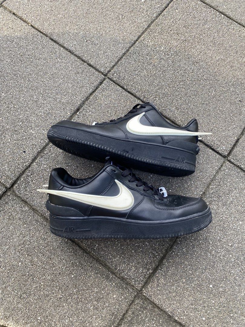 Nike x Ambush Air Force 1 Low Black White (Category: Sneakers) located in Davao. Submitted by thirdy.pfp (Listing ID 1466654424, Image 1). Description: Nike Af1 x Ambush 5.5 us / 23 cm Excellent 9/10 *washable dirts -1200 Nike Air Force 1 Low collaboration with Ambush. Black leather upper with exaggerated white Swoosh extending past the heel. AMBUSH branding on the heel bumper and tongue tag. AF1 lace dubraes attached. Soles show minimal wear. Cl