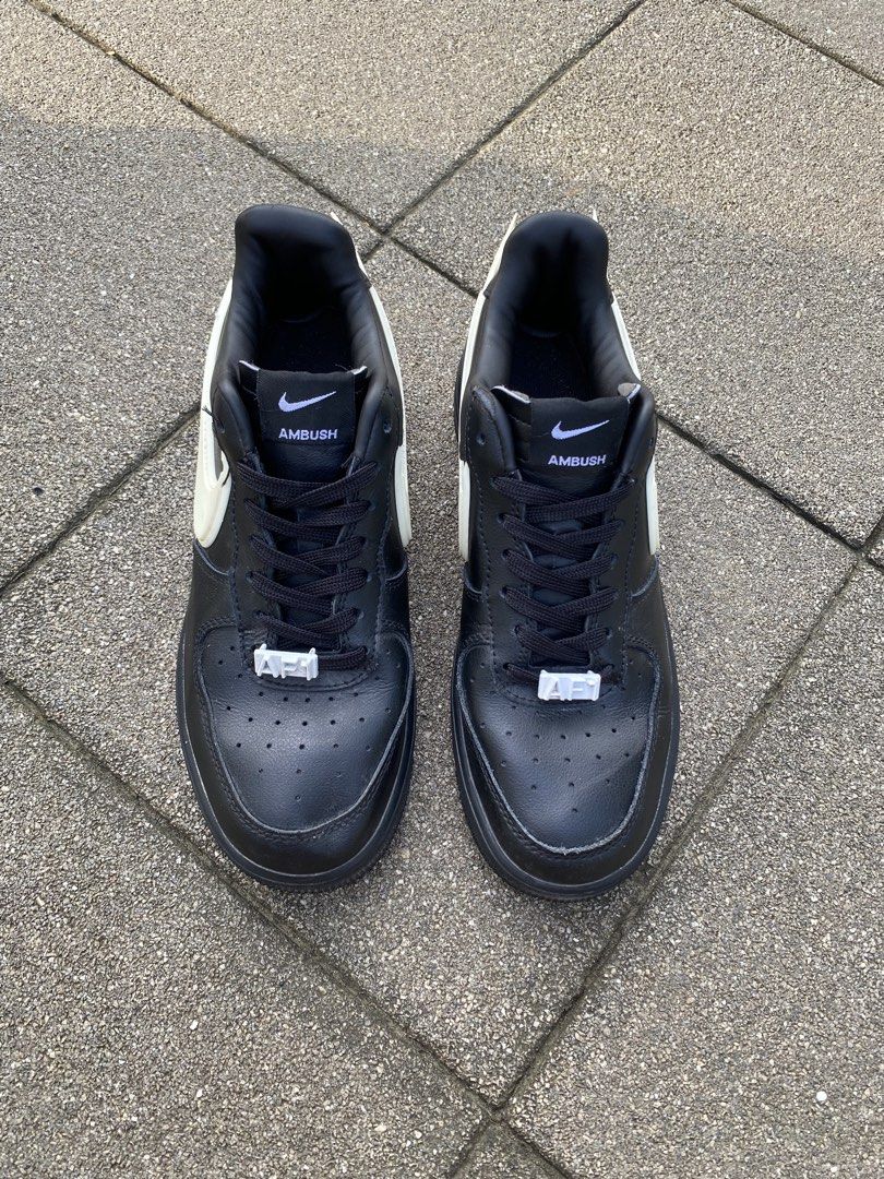 Nike x Ambush Air Force 1 Low Black White (Category: Sneakers) located in Davao. Submitted by thirdy.pfp (Listing ID 1466654424, Image 3). Description: Nike Af1 x Ambush 5.5 us / 23 cm Excellent 9/10 *washable dirts -1200 Nike Air Force 1 Low collaboration with Ambush. Black leather upper with exaggerated white Swoosh extending past the heel. AMBUSH branding on the heel bumper and tongue tag. AF1 lace dubraes attached. Soles show minimal wear. Cl