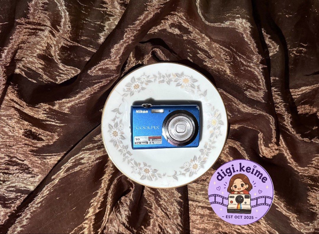Nikon Coolpix S220 (preloved) (Category: Cameras) located in Manila. Submitted by digi.keime (Listing ID 1466673388, Image 1). Description: No Issue! Rare colorway💙🦋 📷 Nikon Coolpix S220 💰₱5,299 ୨୧ ── QUICK SPECS ── ୨୧ ♡ 10 MP ♡ Electronic Vibration Reduction ♡ 3x Optical Zoom ♡ VGA 640x480 resolution at 30 fps ୨୧ ── INCLUSIONS ── ୨୧ ♡ Camera unit ♡ Battery ♡ Charger ♡ Memory card ୨୧ ── CONDITION ── ୨୧ ♡ No Issue! (Please manage your expectat