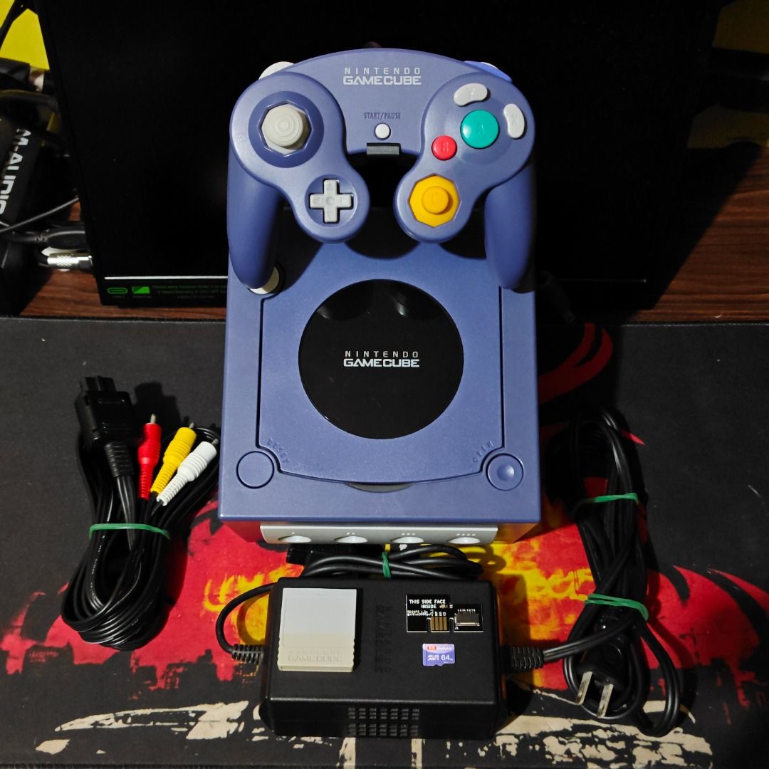Nintendo GameCube Bundle (Category: Nintendo) located in Alburquerque. Submitted by vaughne (Listing ID 1466753911, Image 1). Description: Kindly read the description before making an inquiry. Price is firm. Includes: - Nintendo GameCube (Indigo) [DOL-001, NTSC-J] - Nintendo GameCube Controller (Indigo) [T3] - Nintendo GameCube Memory Card (59 Blocks) [DOL-008] - Nintendo GameCube AC Adapter (100V) [JPN] - Nintendo Stereo AV Cable [SHVC-008] - SD