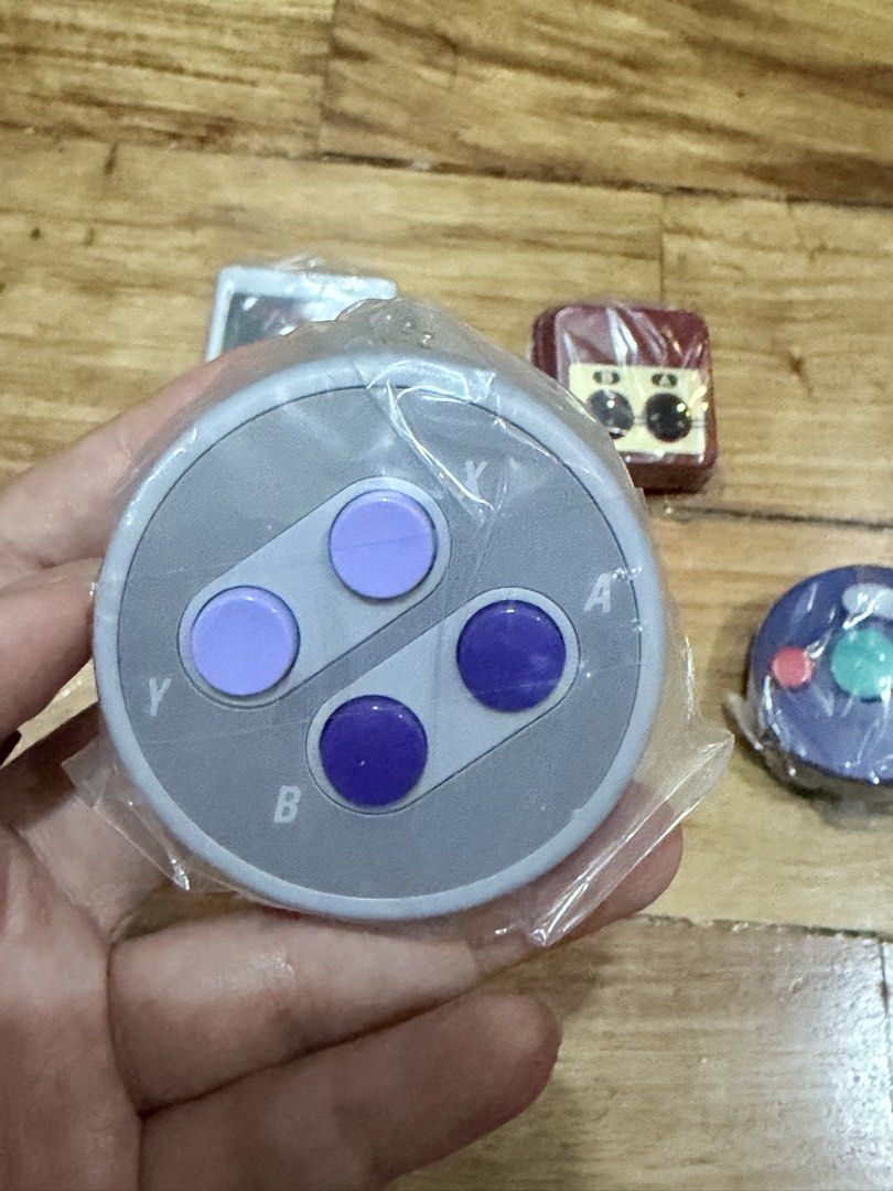 Nintendo Retro Console Controller Keychain (Gachapon) (Category: Everything Else Others) located in Taguig. Submitted by shponline (Listing ID 1466725404, Image 2). Description: Nintendo Retro Console Controller Keychain (Gachapon) *gachapon ball/container not included Random ETA: October 29 50% downpayment to reserve.