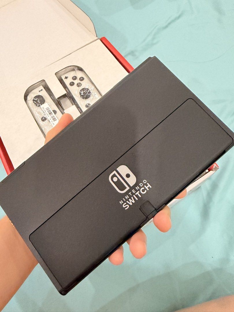 Nintendo switch oled Jailbreak (Category: Nintendo) located in Antipolo. Submitted by guchilove (Listing ID 1466772288, Image 3). Description: Nintendo switch oled Jailbreak With 256gb MIGFLASH. Full of games Complete with box HDMI Dock Grip Strap Charger Good as brandnew. 100% Smooth 📍Antipolo loc pm sa interested .