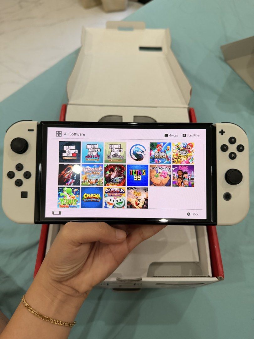 Nintendo switch oled Jailbreak (Category: Nintendo) located in Antipolo. Submitted by guchilove (Listing ID 1466772288, Image 1). Description: Nintendo switch oled Jailbreak With 256gb MIGFLASH. Full of games Complete with box HDMI Dock Grip Strap Charger Good as brandnew. 100% Smooth 📍Antipolo loc pm sa interested .