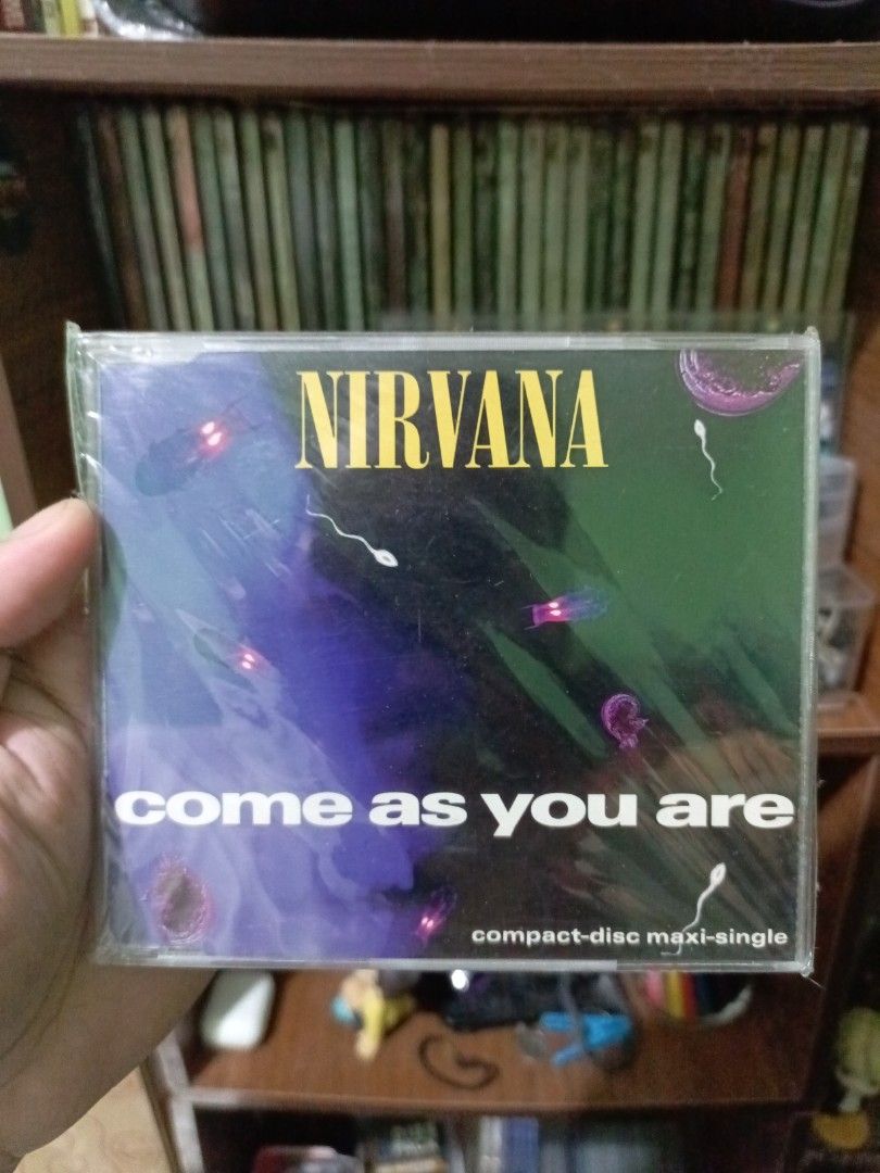 Nirvana Come As You Are Maxi-Single CD (Category: CDs & DVDs) located in Manila. Submitted by crashandburn101 (Listing ID 1466744900, Image 1). Description: - Artist/Album: Nirvana - Come As You Are CD Maxi-Single - Catalog Number: GED 21715 (Made in Germany) - Tracklist: Come As You Are, Endless Nameless, School, and Drain You - Condition: Jewel case still comes with original plastic wrap - Ideal for: Grunge and rock music physical media collect