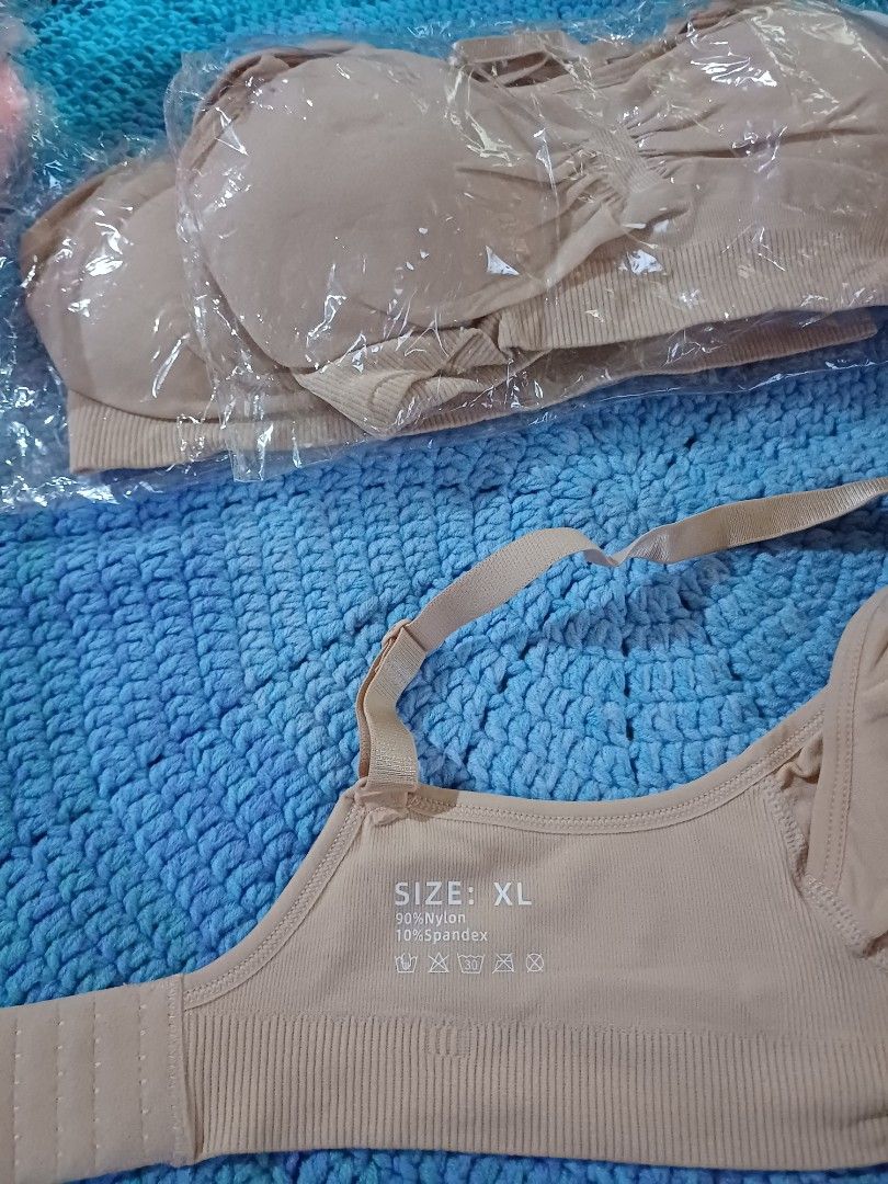 Nude Maternity Nursing Bra Size XL & XXL Bundle (Category: Maternity wear) located in San Pedro. Submitted by purpledream0316 (Listing ID 1466702035, Image 2). Description: - Bundle of comfortable nursing bras in versatile nude and peach shades - Sizes included: XL and XXL - Material: Stretchy 90% nylon and 10% spandex blend - Design: Seamless with convenient drop-down clips for easy feeding - Condition: Brand new, several pieces still sealed in 