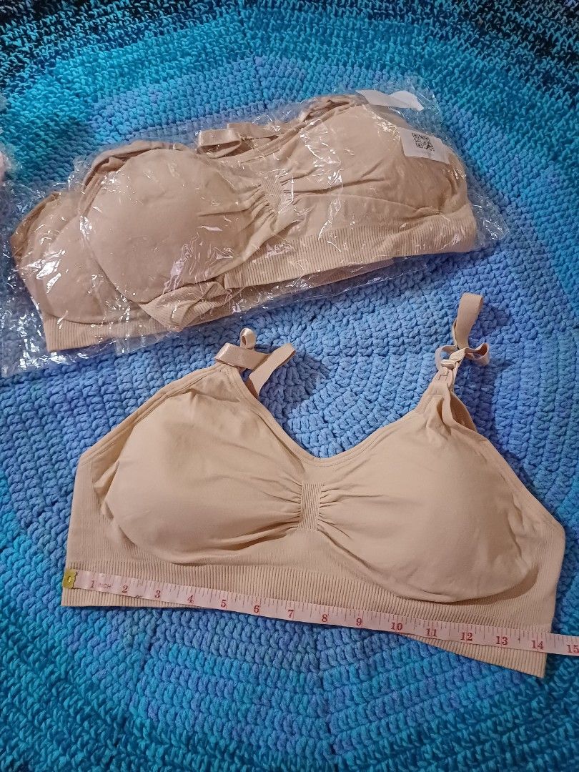 Nude Maternity Nursing Bra Size XL & XXL Bundle (Category: Maternity wear) located in San Pedro. Submitted by purpledream0316 (Listing ID 1466702035, Image 1). Description: - Bundle of comfortable nursing bras in versatile nude and peach shades - Sizes included: XL and XXL - Material: Stretchy 90% nylon and 10% spandex blend - Design: Seamless with convenient drop-down clips for easy feeding - Condition: Brand new, several pieces still sealed in 