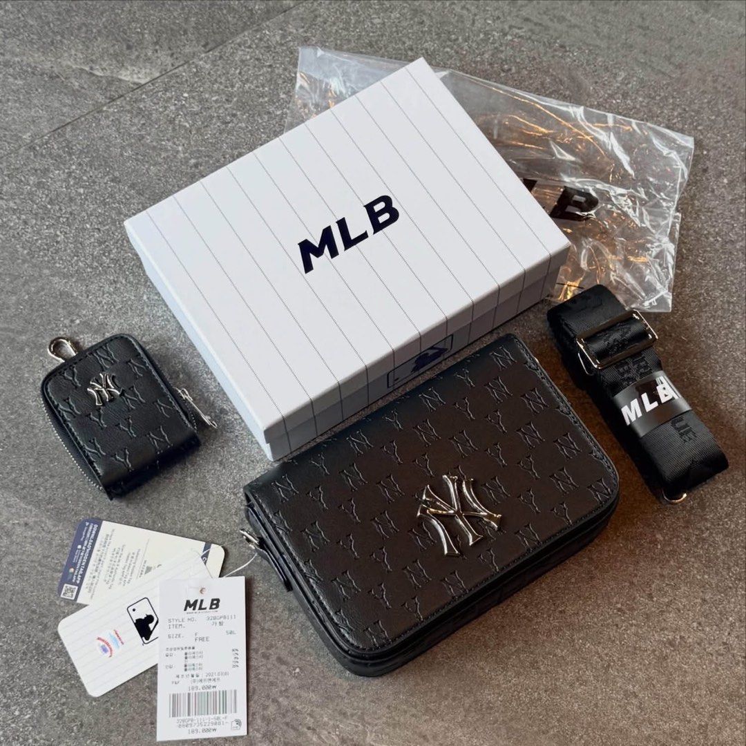 NY MLB SLING BAG (Category: Sling Bags) located in Manila. Submitted by hotlinebling_co. (Listing ID 1466763437, Image 2). Description: NY MLB Mońoğram Sling bag Comes with Sling coin purse, MLB KOREA HARD BOX With hangtags Adjustable strap Inner pocket Inner 1zip SALE‼️.