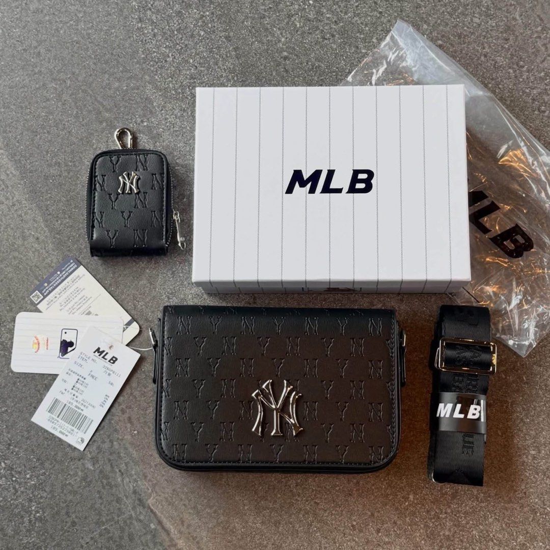 NY MLB SLING BAG (Category: Sling Bags) located in Manila. Submitted by hotlinebling_co. (Listing ID 1466763437, Image 1). Description: NY MLB Mońoğram Sling bag Comes with Sling coin purse, MLB KOREA HARD BOX With hangtags Adjustable strap Inner pocket Inner 1zip SALE‼️.