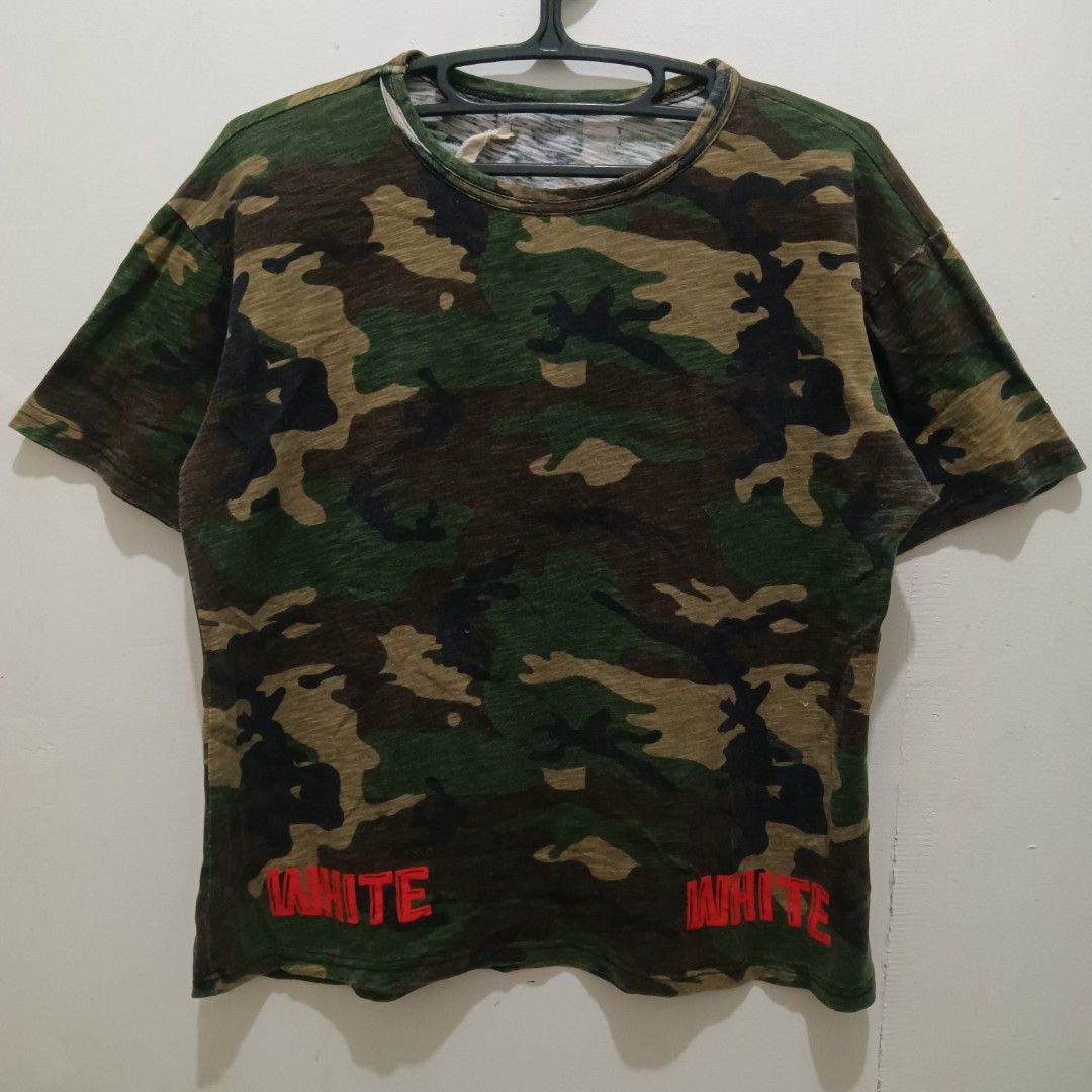 OFF WHITE Camouflage Shirt (Category: Tshirts & Polo Shirts ) located in Caloocan City. Submitted by jaychingsss (Listing ID 1466638757, Image 2). Description: Off White Camo Shirt - 150 21x26 Complete Tags Color Rate: 9/10 NEED WASH.