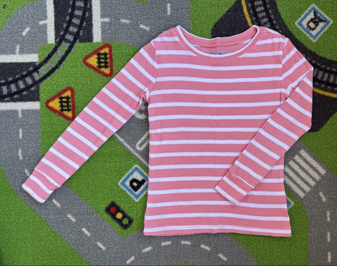 Old Navy Striped Long Sleeve Shirt (Category: Babies & Kids Fashion) located in Rizal. Submitted by preloovved (Listing ID 1466568907, Image 1). Description: Old Navy pink and white striped long sleeve top. Super soft cotton, crew neck, and easy to wash. Preloved, 5yo Meet-up only in GB1 San Mateo, Rizal Shipping fee c/o buyer. Tres Marias or J&T express Payment to be sent to me via BPI/BDO/GCASH only. 😁 C-2.