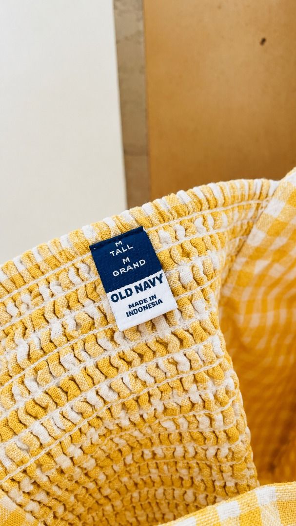 Old Navy Yellow Gingham Dress (Category: Dresses) located in Cebu City. Submitted by prettynuttyoushop (Listing ID 1466682972, Image 2). Description: - Brand: Old Navy - Style: Yellow and white gingham midi dress with a square neckline and thick straps - Fit: Fit with a comfortable smocked back panel - Origin: Made in Indonesia - Condition: Excellent, clean fabric with no stains or damage - Perfect for: Picnic dates, weekend lakwatsas, or casual 