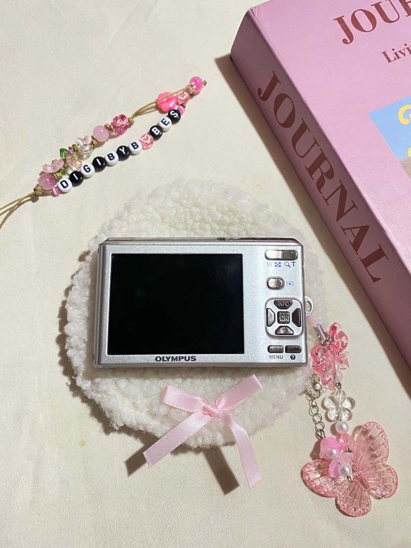 OLYMPUS FE-4050 DIGITAL CAMERA DIGICAM (Category: Cameras) located in Manila. Submitted by jade_snap (Listing ID 1466678469, Image 2). Description: ✧⁠* OLYMPUS FE-4050 - vv crisp output ♡ ₱3,999 READY TO USE lcd burn (doesn't affect the output) 🩰Specs: *.' 12.2 MP *.' 4x optical zoom *.' ISO 80 to 1600 *.' CCD sensor 🎞️ Condition: ७९ all buttons are working, zoom, and flash ७९ body condition: 8/10 ७९ super goods ng output 😩😩 👛 Ready to use! 