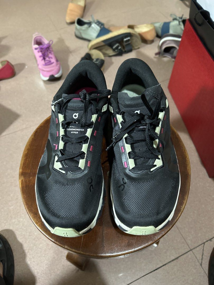 On Cloudmonster Hyper Black Pink Running Shoes (Category: Sneakers) located in Alitagtag. Submitted by patrickvillanueva (Listing ID 1466601465, Image 1). Description: On Cloudmonster Hyper running shoes in black with bright pink lettering and light green accents. Swiss engineering, Helion foam soles, big cushioning. Bold 'ON RUNNING' text printed across the outer sides. Inside tag says Fresh Legs. Very clean uppers, minimal wear on soles. Great 