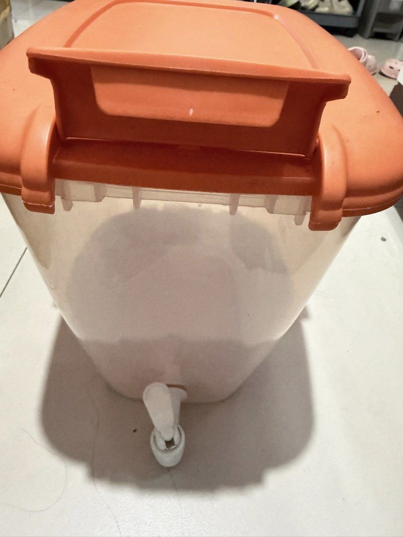 Orange Lid Storage Container with Dispenser Spout (Category: Food Organization & Storage) located in Quezon City. Submitted by bubspreloved (Listing ID 1466724344, Image 1). Description: - Clear body with bright orange lid and built-in handle - Equipped with a convenient white dispensing tap at the front - Secure latches keep the lid tightly shut to prevent leaks - Clean interior and 100% ready for use - Perfect for parties, camping, or everyday 