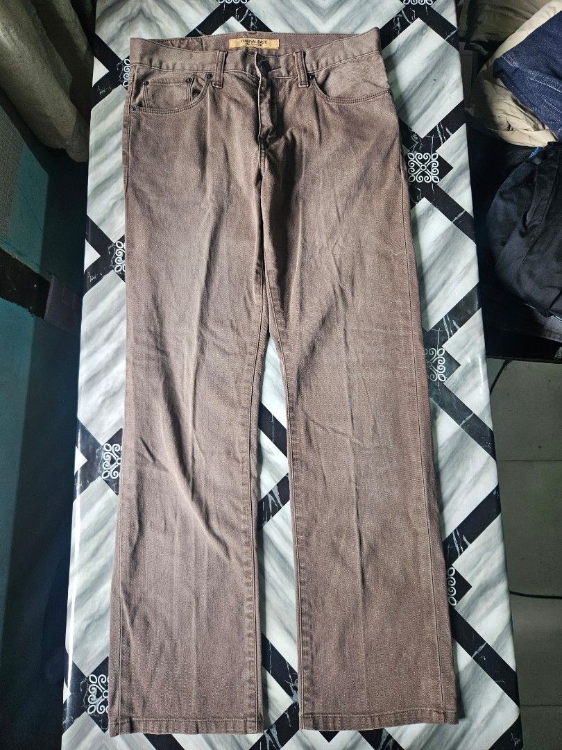 Original Basic Brown Slim Fit Straight Pants (Category: Trousers) located in Manila. Submitted by shanshan.river (Listing ID 1466593317, Image 2). Description: - Color: Versatile basic brown - Fit: Slim fit straight style - Design: Classic five-pocket, button fly, and belt loops - Condition: Excellent, no damage spotted - Fabric: Clean stitching and structured material.