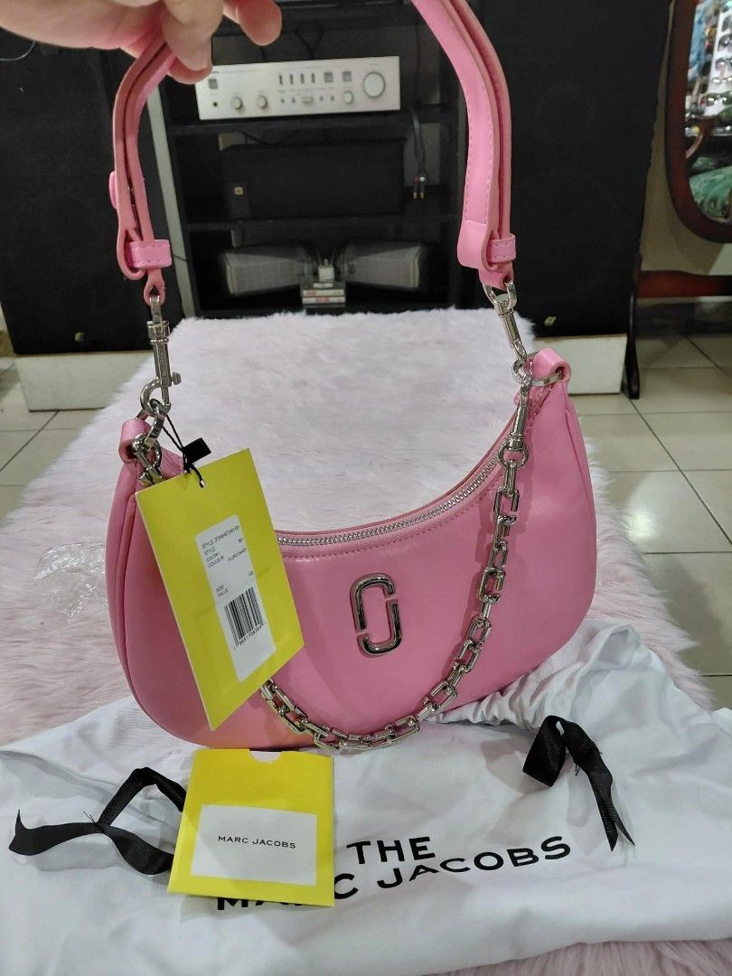 Original Marc Jacobs Pink Hobo Bag (Category: Luxury Bags & Wallets) located in Pasig City. Submitted by janalopez904 (Listing ID 1460505809, Image 2). Description: - Authentic Marc Jacobs (MJ) bag - Original Price: PHP 12,000 - Selling Price: PHP 3,999 - Comes with original dust bag - Includes an extra chain strap - Message me if you're interested!.