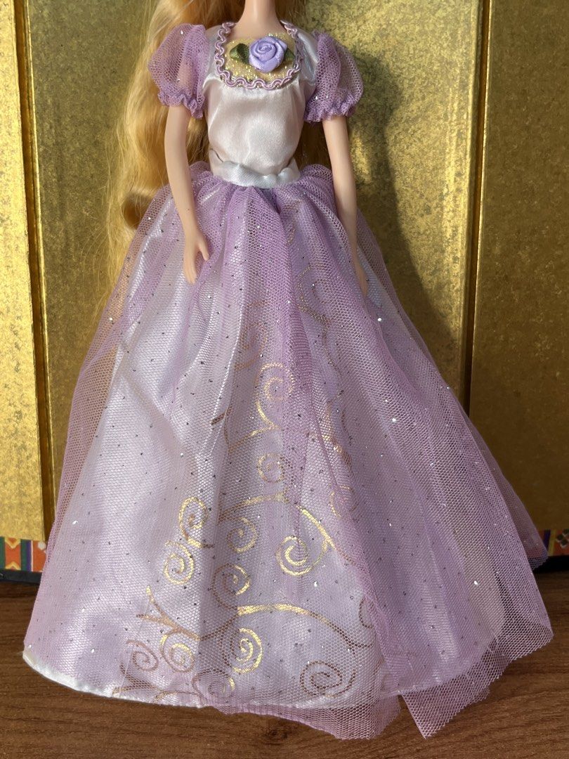 Original Mimi World Rapunzel Doll (Category: Kids Toys) located in Gapan. Submitted by lunashop14 (Listing ID 1466768915, Image 3). Description: SALE!! ₱400 👑 Mimi World Rapunzel Princess Doll 💜 Calling all princess lovers and fashion doll collectors! This beautiful Korean Mimi World doll features extra-long golden blonde locks ready for styling and her iconic lavender princess dress. ✨ Good condition ✨ Perfect addition to any doll collection o