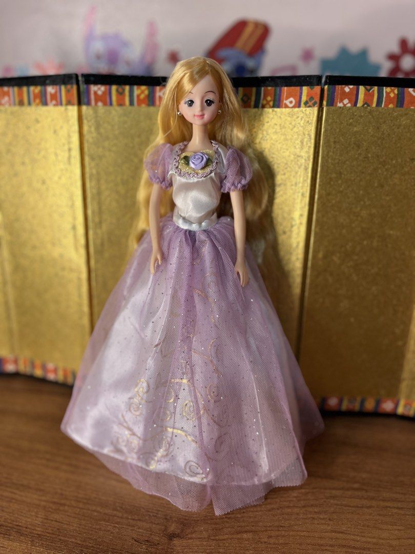 Original Mimi World Rapunzel Doll (Category: Kids Toys) located in Gapan. Submitted by lunashop14 (Listing ID 1466768915, Image 1). Description: SALE!! ₱400 👑 Mimi World Rapunzel Princess Doll 💜 Calling all princess lovers and fashion doll collectors! This beautiful Korean Mimi World doll features extra-long golden blonde locks ready for styling and her iconic lavender princess dress. ✨ Good condition ✨ Perfect addition to any doll collection o