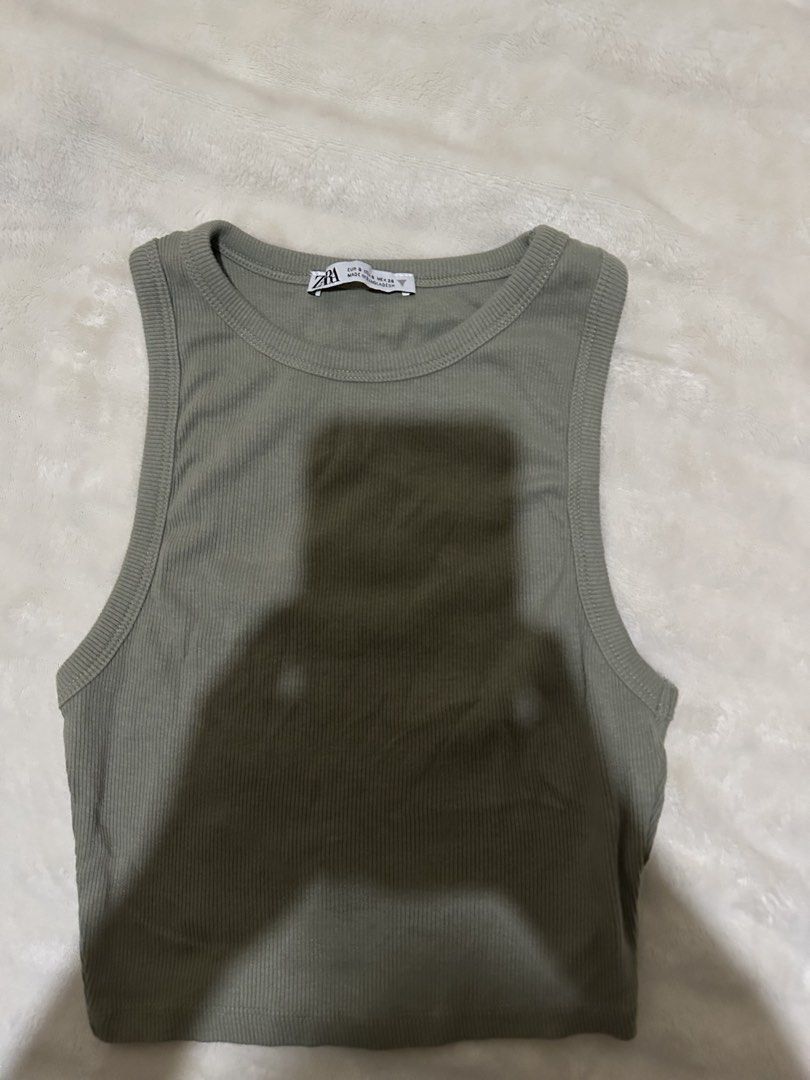 original Zara Ribbed Tank Top (Category: Sleeveless) located in Cavite. Submitted by thebarchives (Listing ID 1466668562, Image 1). Description: - Brand: Zara - Style: Ribbed tank top with scoop neckline and cropped length - good as new (used thrice only) - rfs: gained weight so decluttering cropped tops.