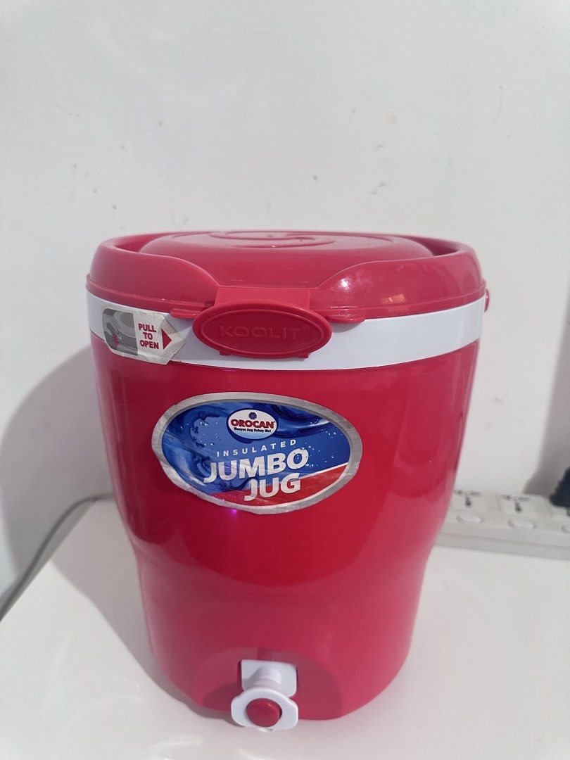 Orocan Koolit Insulated Jumbo Jug Red (Category: Pitchers & Dispensers) located in Bulacan. Submitted by shandi1987 (Listing ID 1466742474, Image 1). Description: - Brand: Orocan Koolit Jumbo Jug - Color: Bright pink-red with white trim - Capacity: Extra-large, perfect for family gatherings and outdoor events - Features: Pull-to-open latch on the lid for easy access - Dispenser: Convenient spigot at the bottom front for effortless pouring - Perfo