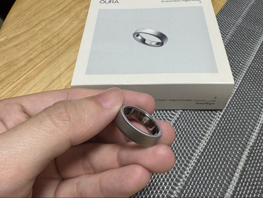 Oura Ring 5 Brushed Silver Size 9 (Category: Wearables & Smart Watches) located in Binangonan. Submitted by jolocoronel (Listing ID 1466731758, Image 2). Description: - Model: Oura Ring Gen 5 - Color/Finish: Brushed Silver (Matte) - Size: 9 - 4 months old, bought in June 2026 - Inclusions: Original box and packaging included; original charger included - Key Features: Advanced health tracking, sleep monitoring, and step count - Condition: Excellen