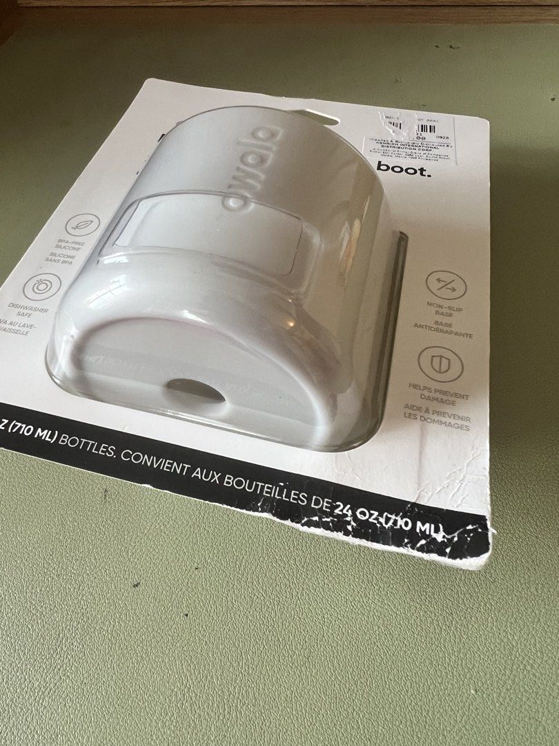Owala Bottle Boot 24 oz Gray Silicone (Category: Water Bottles & Tumblers) located in Mandaluyong City. Submitted by helpmedecluts (Listing ID 1466567049, Image 2). Description: - Bought in Megamall (SRP 490) - Authentic Owala silicone bottle boot in gray - Fits 24 oz (710 ml) Owala bottles - Non-slip base protects against dents and scratches - BPA-free and dishwasher safe - Brand new and still sealed in original retail packaging (just deformed b