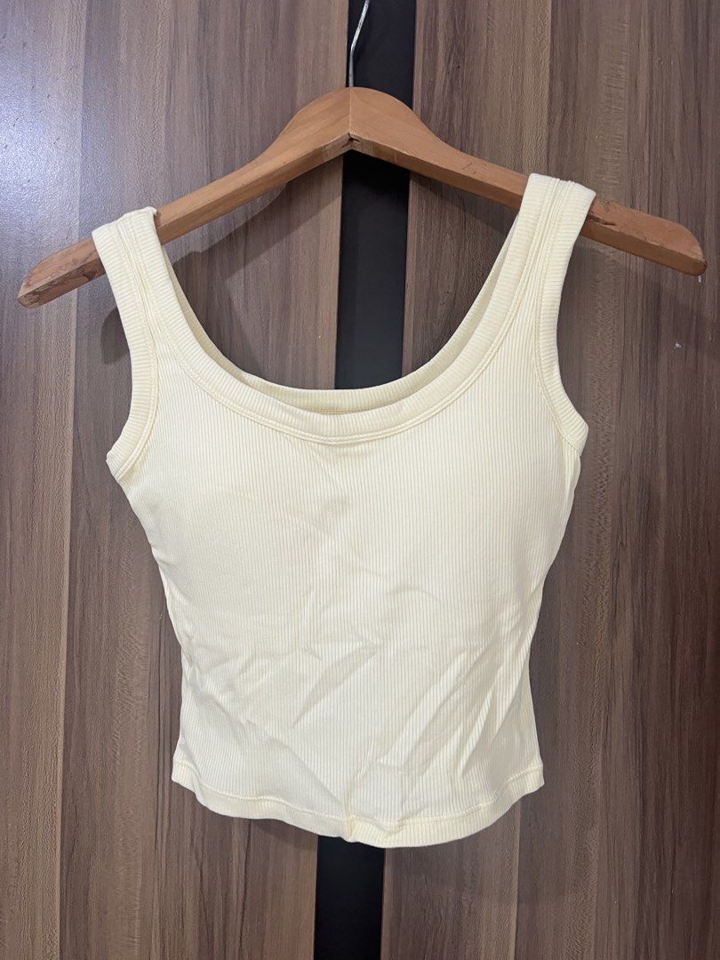 Padded rib knit sleeveless top (Category: Sleeveless) located in Bulacan. Submitted by prelovedbycamilla (Listing ID 1466594063, Image 1). Description: Best fit XS-S Yellow.