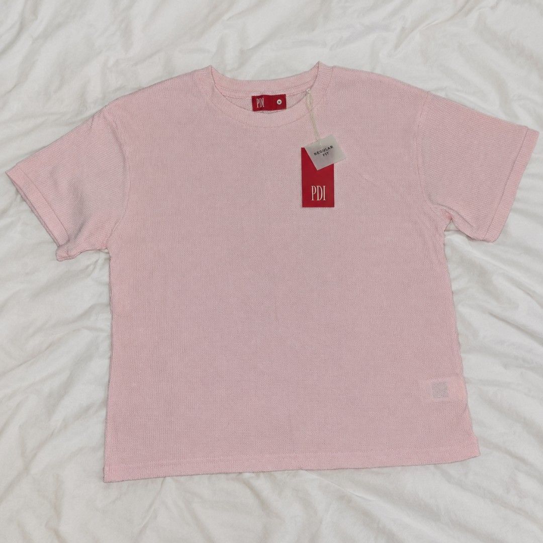 Padini Basic Pink Tshirt (Category: Tshirts & Polo Shirts) located in Sepang. Submitted by amelluvia (Listing ID 1466646196, Image 1). Description: - Brand: PDI - Color: Pink - Size: Medium - Condition: Brand new with original tags attached - Fit: Regular fit - Material: Textured waffle fabric - Details: Crew neckline and straight hem.