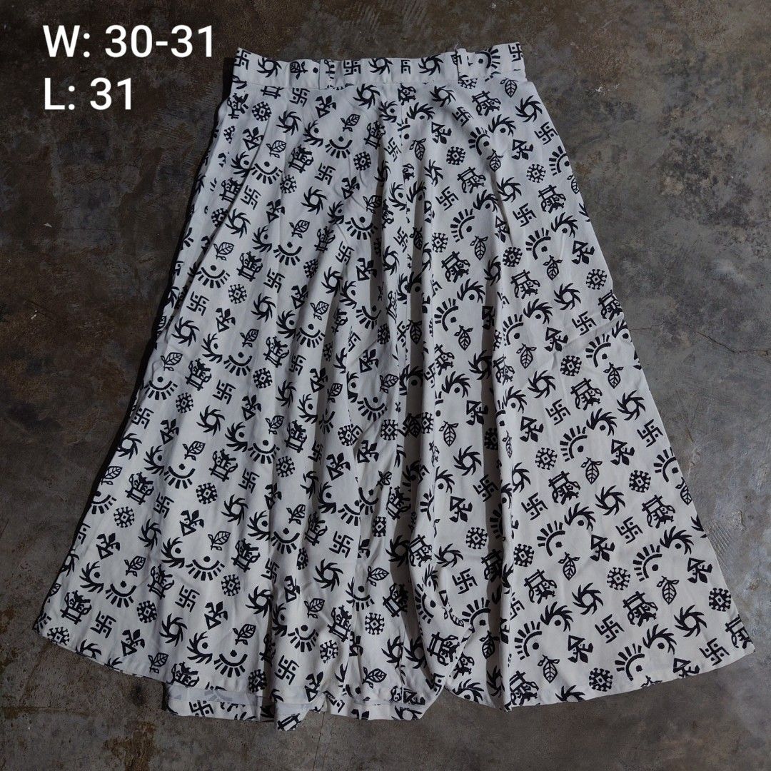 Patterned Black White Skirt (Category: Skirts) located in Diffun. Submitted by declutteredbyJill (Listing ID 1466645568, Image 1). Description: - Design: Bold black and white tribal symbols and eye print - Fit: Waist 30 to 31 inches, Length 31 inches - Style: Wide-leg with a chic, flowy drape - Details: Flattering structured waistband - Mode of Payment: GCash, BPI, or Bank Transfer - Shipping: Same-day shipping via Lalamove/Grab (Metro Manila) or