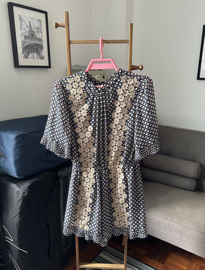 Patterned romper (Category: Rompers) located in Singapore. Submitted by jchmsell (Listing ID 1466728231, Image 1). Description: - Cute romper - Geometric and floral print - Short flutter sleeves - Ruffled hem - Open back with tie detail - Elasticated waist - Perfect for casual outings or nights out Ptp- 42cm Length- 77cm Condition: like new .