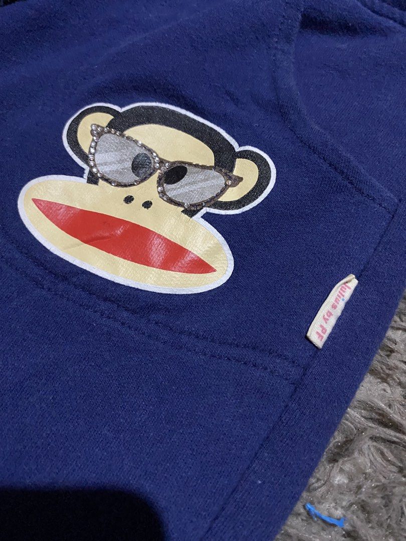 Paul Frank Julius Blue Sweatpants Drawstring Lounge Pants (Category: Joggers) located in Caloocan City. Submitted by remythrift (Listing ID 1466697743, Image 2). Description: - Brand: Paul Frank Julius - Color: Navy blue with contrasting red adjustable drawstring waistband - Design: Iconic monkey graphic on upper left pocket with sparkly rhinestone glasses details - Pockets: Two functional front pockets with a small side logo tag - Condition: Sho