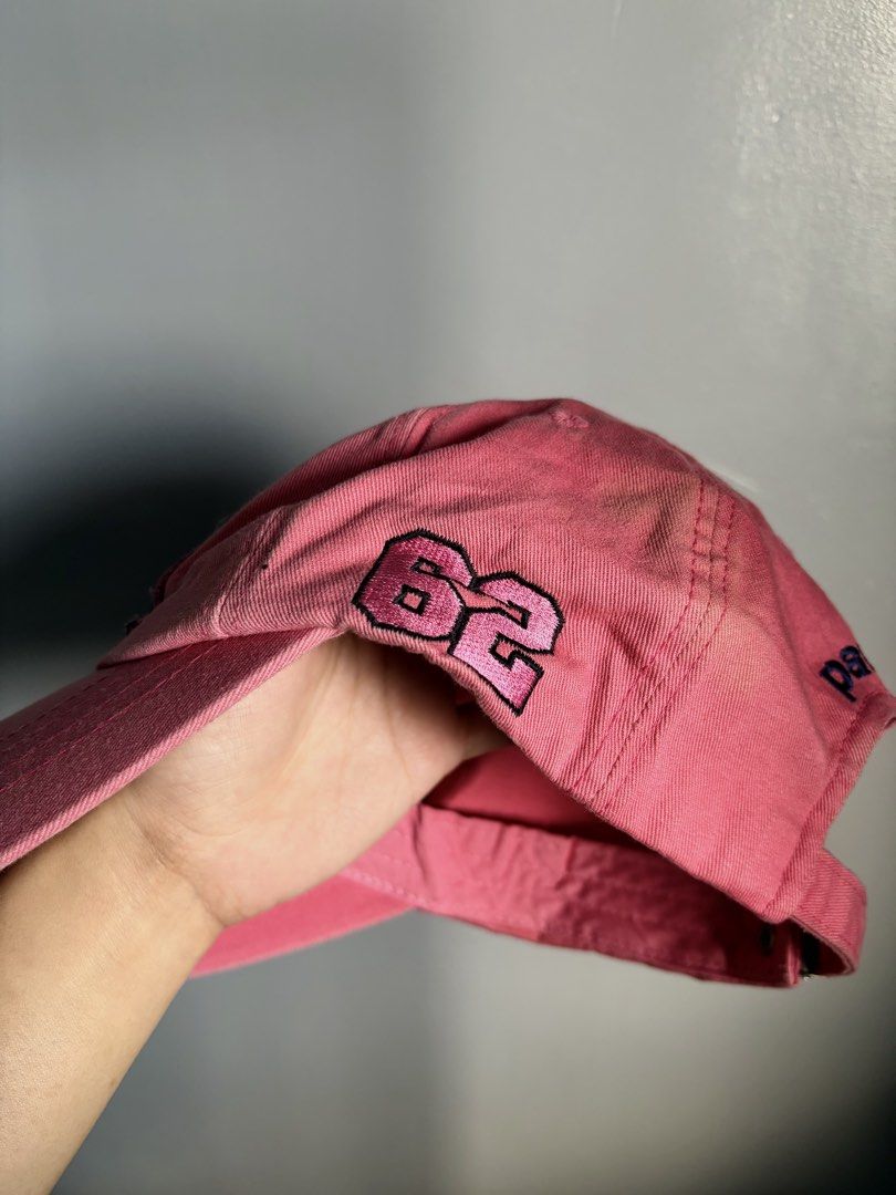 Paul Frank Pink Baseball Cap with Logo Patch (Category: Caps & Hats) located in Manila. Submitted by silentwhale_543e69 (Listing ID 1466682167, Image 3). Description: - Authentic Paul Frank pink baseball cap - Classic six-panel design in clean cotton twill - Features embroidered brand patch on the front, '62' on the side, and text near the back - Adjustable metal buckle closure for a custom fit - Inner brown brand label (Size F) - Condition: Exce