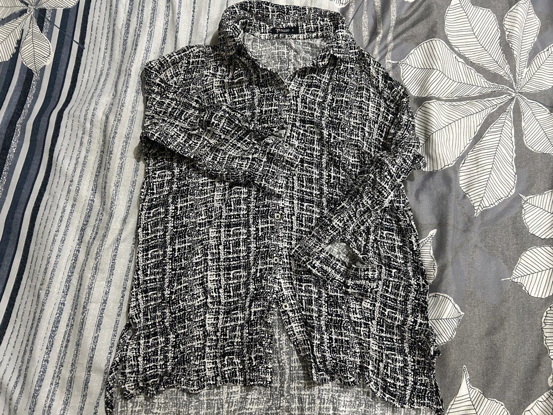Pazzo Black and White Patterned Button-Down Shirt Size S (Category: Blouses) located in Manila. Submitted by mihos.garage.sale (Listing ID 1466601529, Image 1). Description: NEM YOUR PRICE 😉 - Brand/Model: Pazzo button-down shirt - Design: Black and white abstract pattern - Size: Small (tag attached near collar) - Features: Long sleeves, collared neckline, front button closure - Material: Lightweight fabric - Style: Great for casual everyday out
