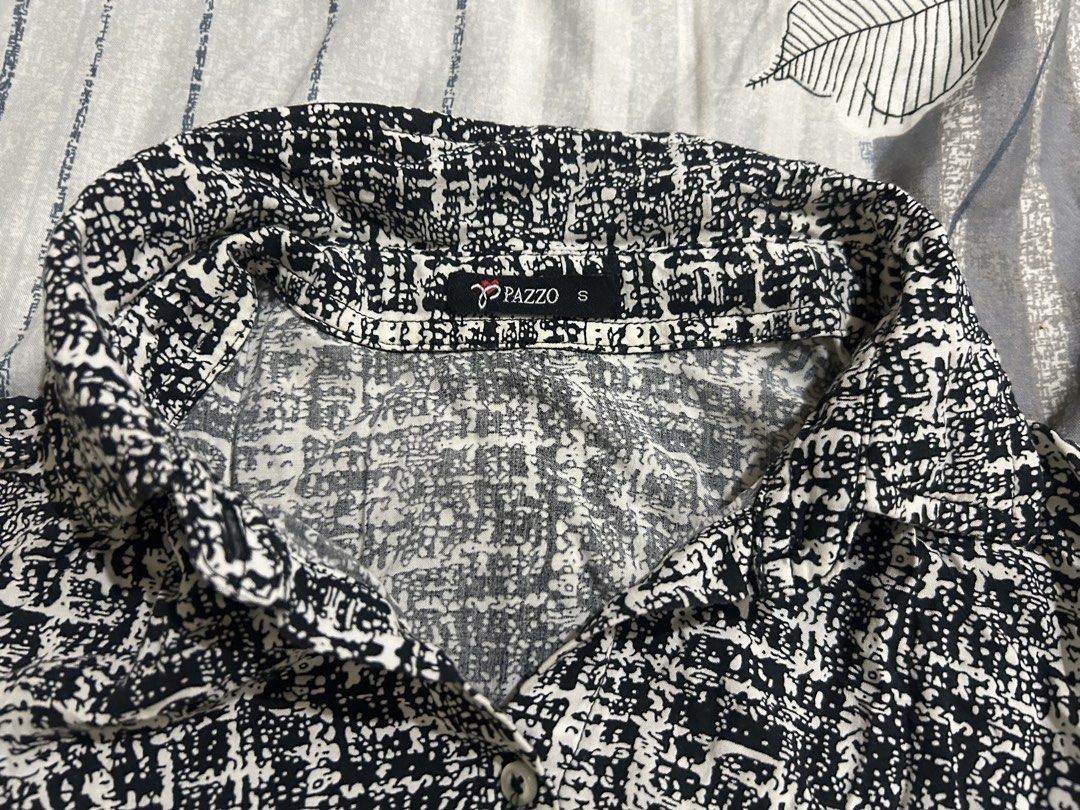Pazzo Black and White Patterned Button-Down Shirt Size S (Category: Blouses) located in Manila. Submitted by mihos.garage.sale (Listing ID 1466601529, Image 2). Description: NEM YOUR PRICE 😉 - Brand/Model: Pazzo button-down shirt - Design: Black and white abstract pattern - Size: Small (tag attached near collar) - Features: Long sleeves, collared neckline, front button closure - Material: Lightweight fabric - Style: Great for casual everyday out