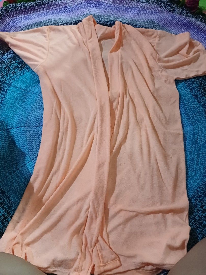 Peach color bathroom robe (Category: Maternity wear) located in San Pedro. Submitted by purpledream0316 (Listing ID 1466708992, Image 1). Description: - Color: Peach - Style: bathroom robe - Material: Super soft knit - Sleeves: Short sleeves - Features: Versatile solid color, perfect for layering on breezy days.