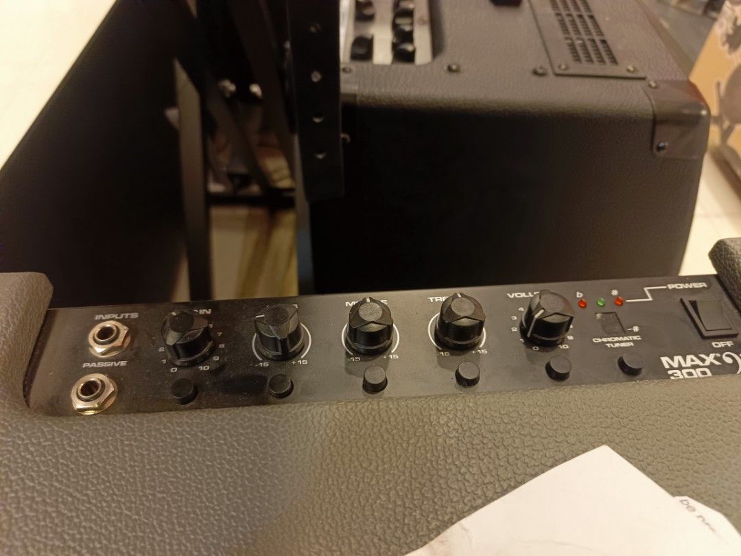 Peavey MAX 300 Bass Amplifier (Category: Musical Instruments) located in Manila. Submitted by shelian09 (Listing ID 1466637707, Image 2). Description: - Model: Peavey MAX 300 Bass Amp - Condition: Clean and well-maintained unit - Build: Solid construction with heavy-duty front metal grille - Controls: Top-mounted gain, bass, mid, treble, volume knobs, and built-in chromatic tuner - Inputs: Standard jacks for both active and passive bass guitars -