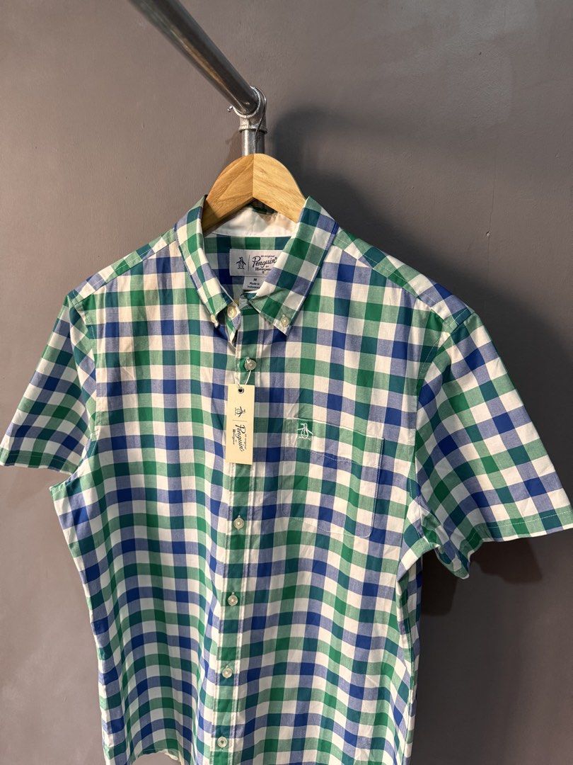 Penguin - Button Up shirt (Category: Activewear) located in Cabuyao City. Submitted by _streetflavor (Listing ID 1466616087, Image 2). Description: Penguin - Button Up shirt Excellent Size: Medium Length: 28 Width: 21.5 -980 pesos Dm.