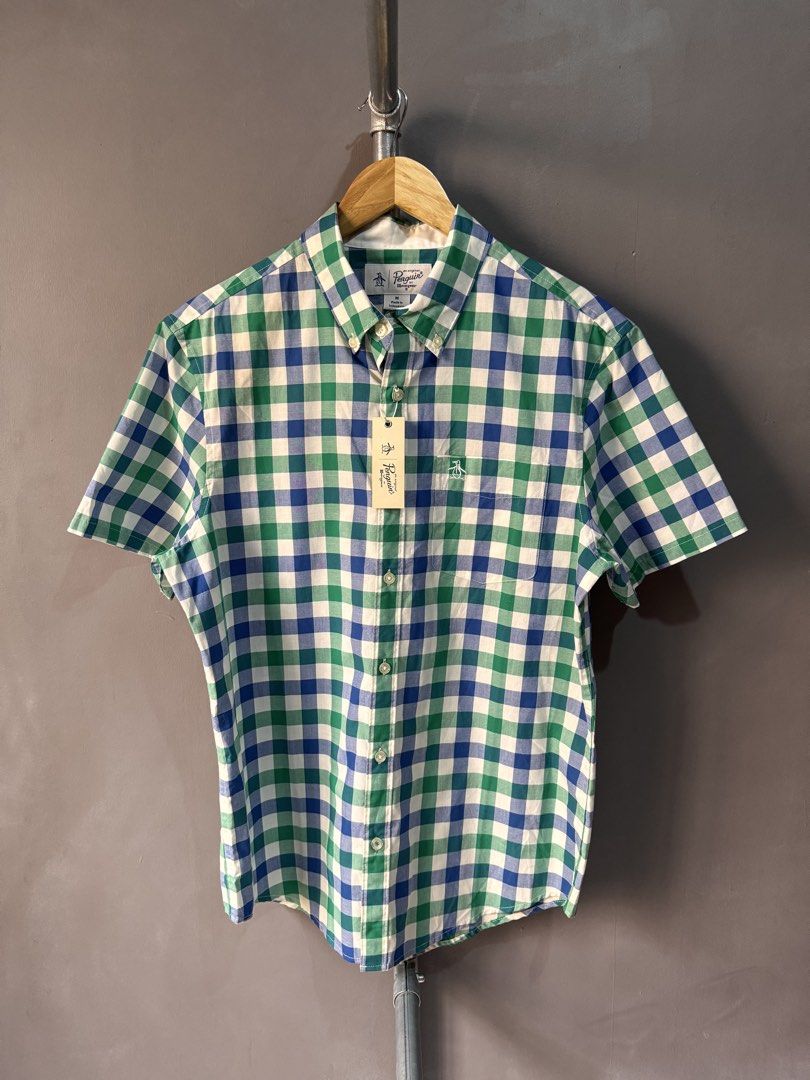 Penguin - Button Up shirt (Category: Activewear) located in Cabuyao City. Submitted by _streetflavor (Listing ID 1466616087, Image 1). Description: Penguin - Button Up shirt Excellent Size: Medium Length: 28 Width: 21.5 -980 pesos Dm.