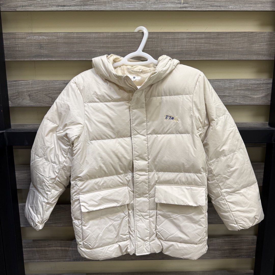 [Petite] Uniqlo White Padded Jacket (Category: Coats, Jackets and Outerwear) located in Mandaluyong City. Submitted by bestdressedph2025 (Listing ID 1466670526, Image 1). Description: MOP: GCash MOD: Lalamove/J&T LOCATION: Brgy. Addition Hills, Mandaluyong Discount avail for multiple items. Dimensions in Inches: Shoulder: 17 Bust: 19 Length: 26 Size on Tag: 150 PM for inquiries!.