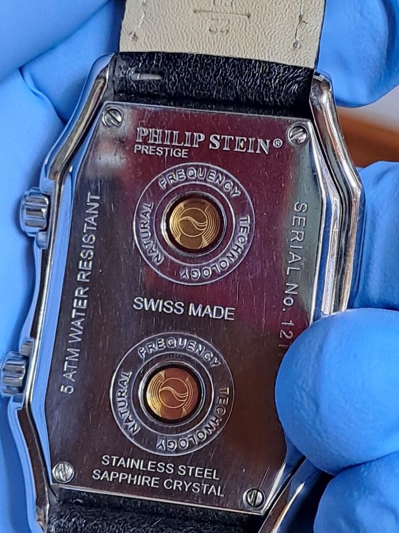 Philip Stein Prestige Dual Time Watch (Category: Luxury Watches) located in Quezon City. Submitted by mastervintage (Listing ID 1466570910, Image 2). Description: - Brand: Philip Stein Prestige Dual Time - Movement: Swiss-made movement with dual separate dials and crowns - Dial: Textured silver patterns with bold numbers - Case: Stainless steel with 5 ATM water resistance and Natural Frequency Technology caseback - Strap: Black leather strap with