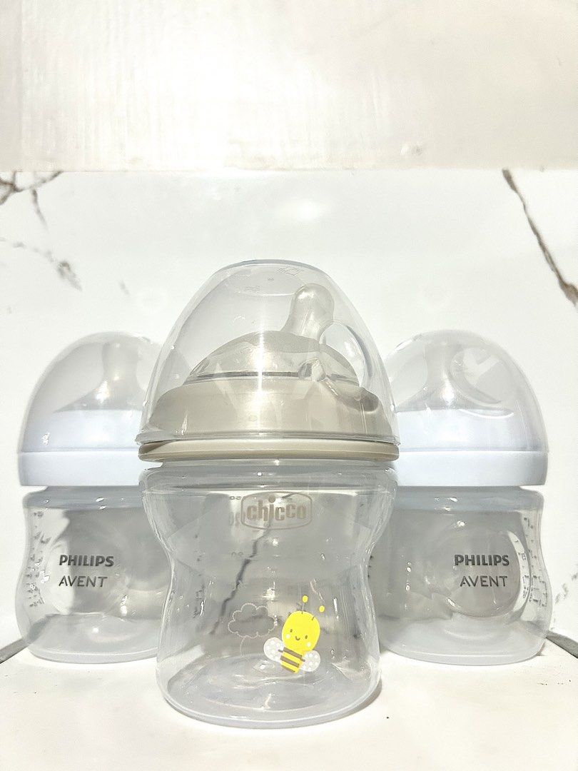 Philips Avent and Chicco Baby Bottles Bundle (Category: Breastfeeding & Bottle Feeding) located in Batangas. Submitted by nixiaempleo23 (Listing ID 1466599141, Image 1). Description: - no box - 0+ months - Bundle of 3 trusted baby feeding bottles - 2x Philips Avent bottles with white caps - 1x Chicco bottle with a cute yellow bee graphic and grey cap - Includes protective covers for hygiene - Standard neck size with clear measurement markings - E