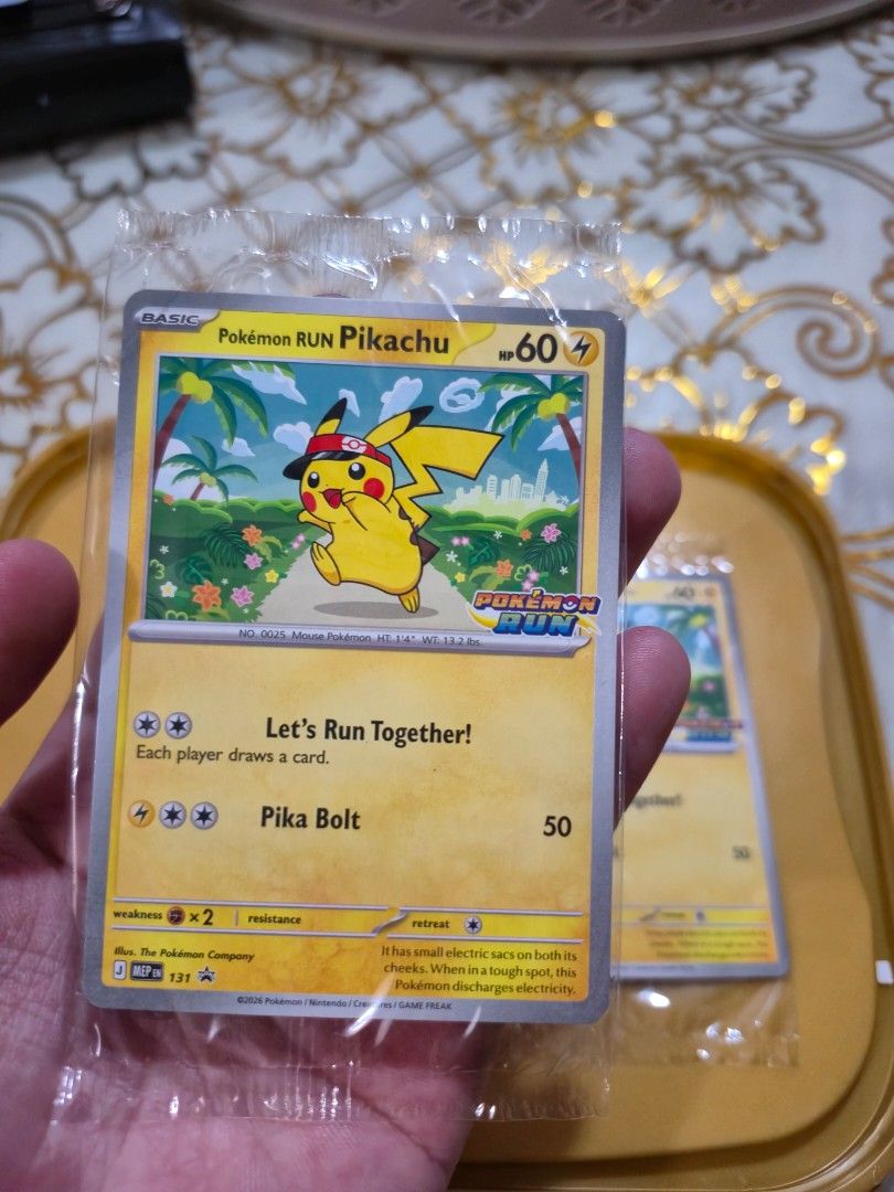 Pikachu 131 SAR (Category: Raw Singles) located in Caloocan City. Submitted by buenaventu80818 (Listing ID 1466734670, Image 3). Description: Pokémon RUN Pikachu promo card (MEP Promo 131) mint condition (sealed) I have two if it, I can sell both for Php 15,000.