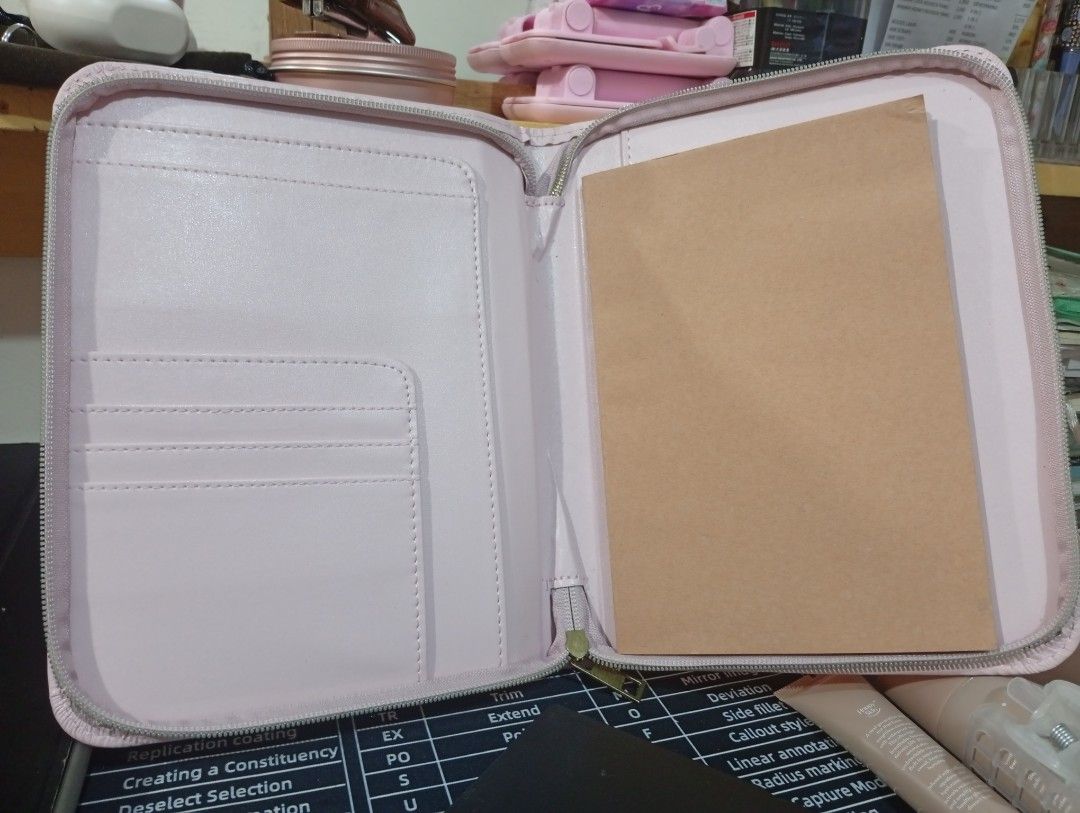 Pink Inspirational Quote Planner Organizer Notebook (Category: Stationery & School Supplies) located in Quezon City. Submitted by bownee.free (Listing ID 1466772160, Image 3). Description: - Color: Pastel pink with elegant gold foil lettering - Quote: "She believed she could, so she did" - Closure: Secure full-zip around in gold - Interior: Includes card slots, slip pockets, and a notebook insert - Use: Ideal for journaling, school, or work organ