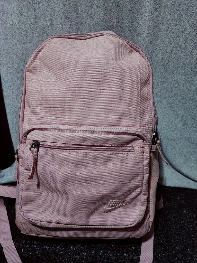Pink Nike Backpack with Front Pocket (Category: Backpacks) located in Baguio. Submitted by ozara.06 (Listing ID 1466730425, Image 1). Description: Nike backpack Large size With laptop compartment for 16" Has washable dirt 750.